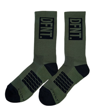 Load image into Gallery viewer, DFNT. performance socks in army green.  The logo is negative space in black to match the heel and toe.  The Defiant Co is woven in to the bottom of the sock in black along with some stripes that track the slightly elasticated sole to help keep them in place during workouts.