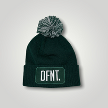 Load image into Gallery viewer, A bottle green beanie hat with a two tone green and white bobble on top. The hat is branded with DFNT. embroidered on the centre patch in white. It is soft to the touch and has a double layer knit and ribbed cuff.